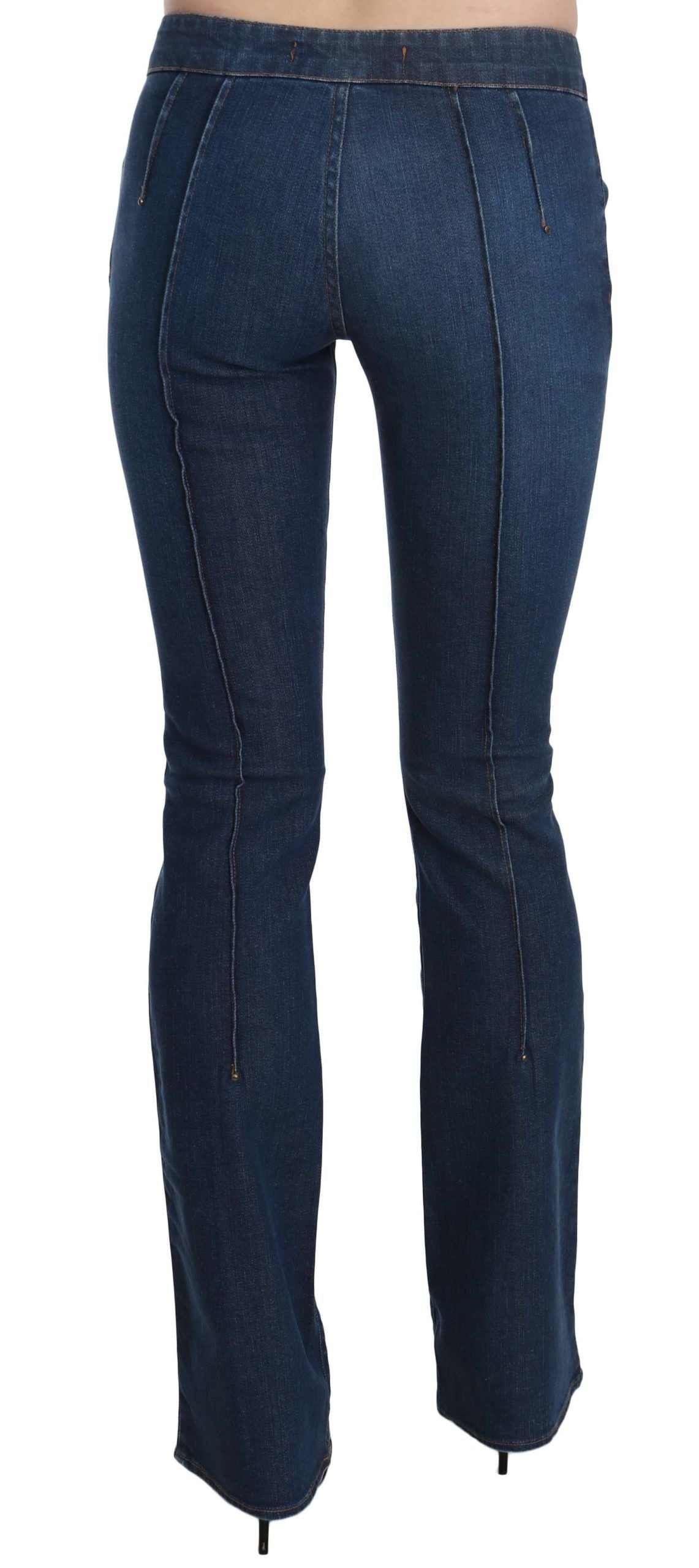 Blue denim pants with zipper details on legs