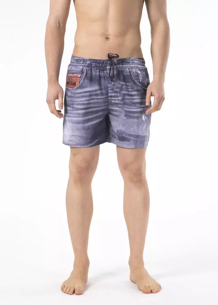 Man wearing blue shorts