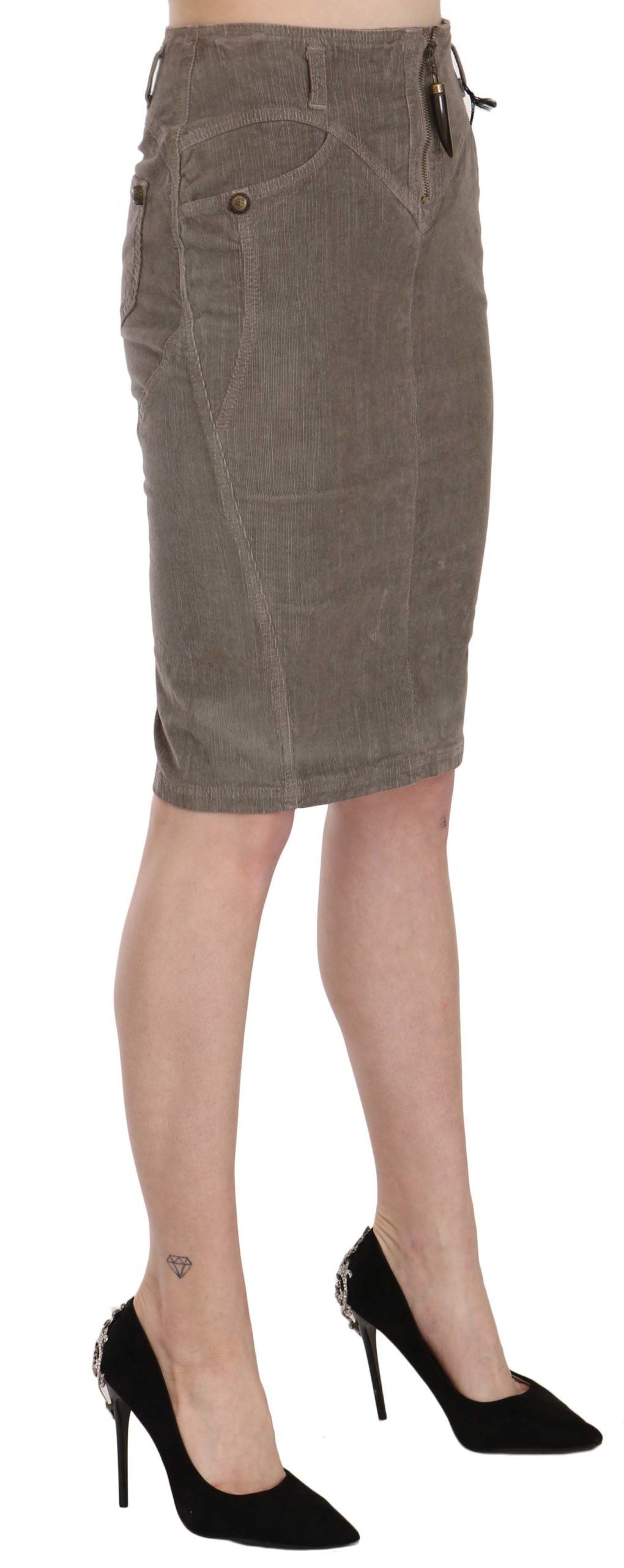 Woman wearing a gray skirt and black heels