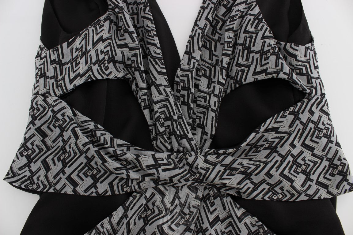 Black and white patterned fabric with a design resembling Darth Vader's mask