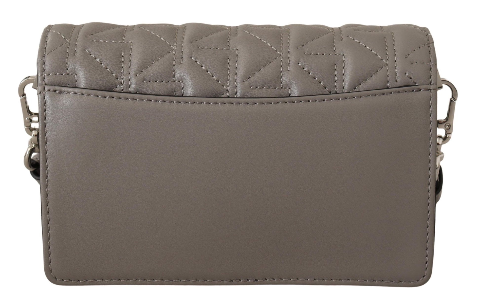 Brown leather wallet with embossed design on front