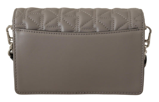 Brown leather wallet with embossed design on front