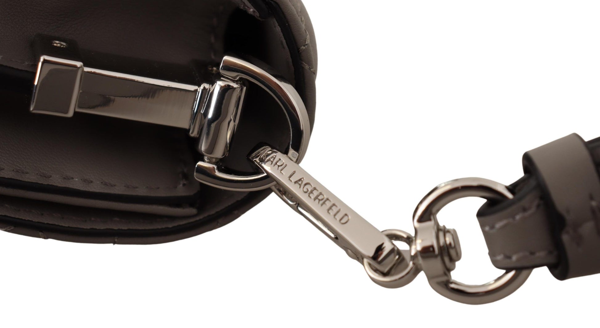Silver zipper pull on black leather bag