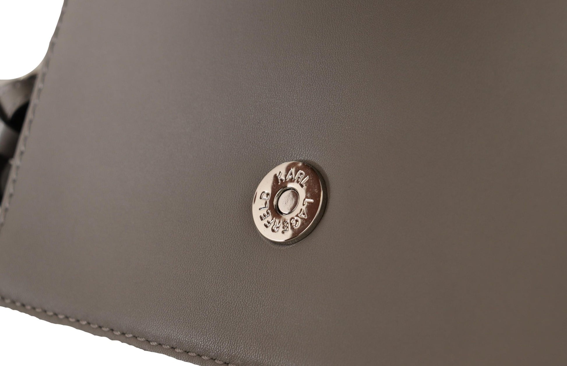 Brown leather wallet with gold emblem on front