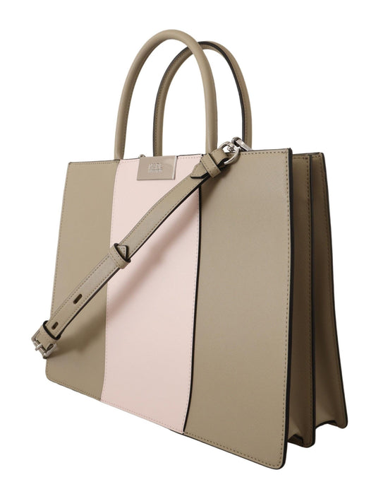 Tan leather handbag with pink and black accents