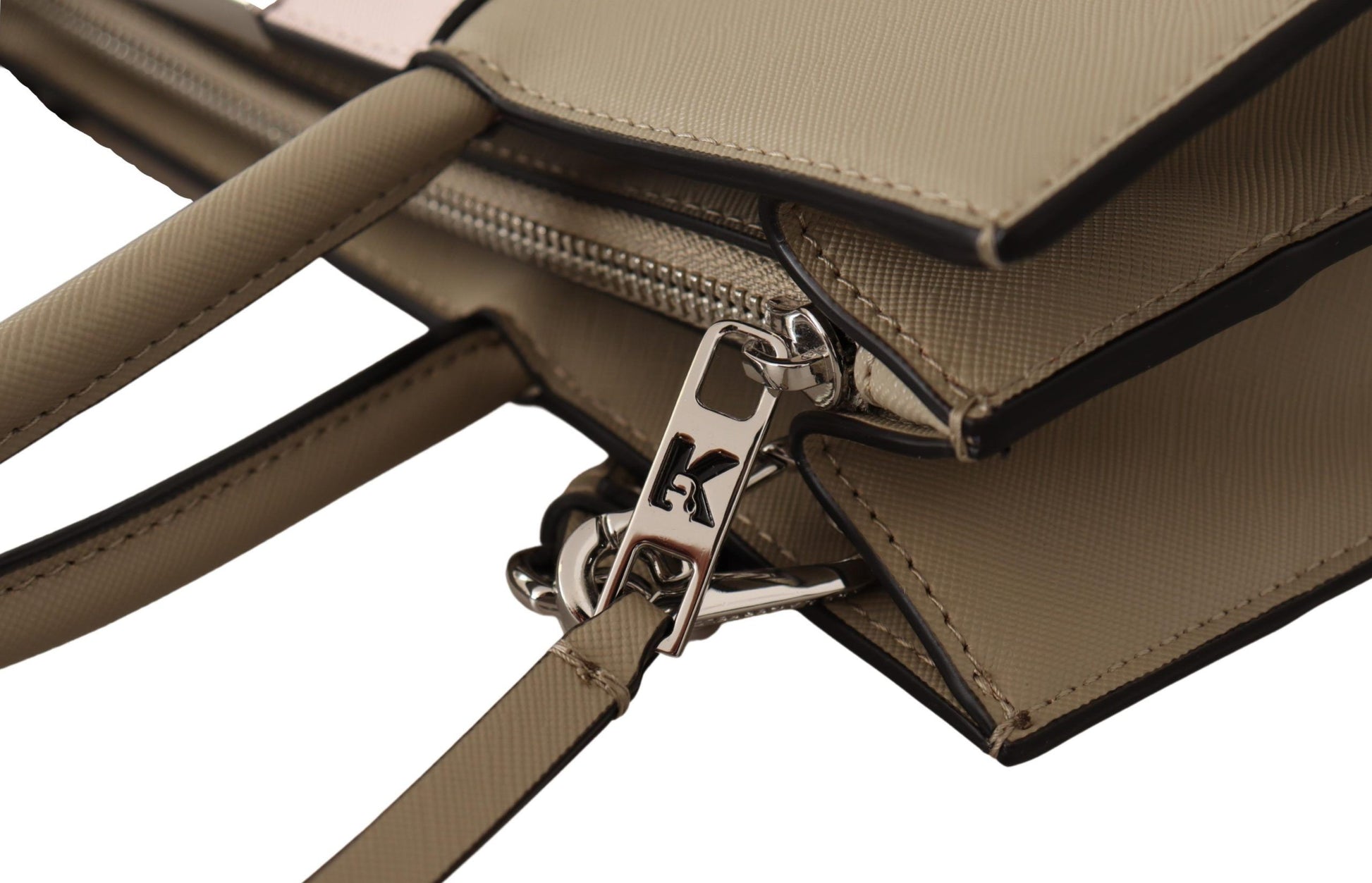 Brown leather handbag with metal zipper pulls