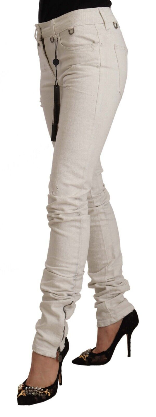 Pair of women's jeans with distressed detailing on legs