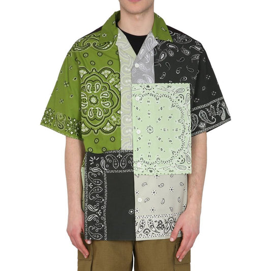 Man wearing a shirt with multiple bandana patterns