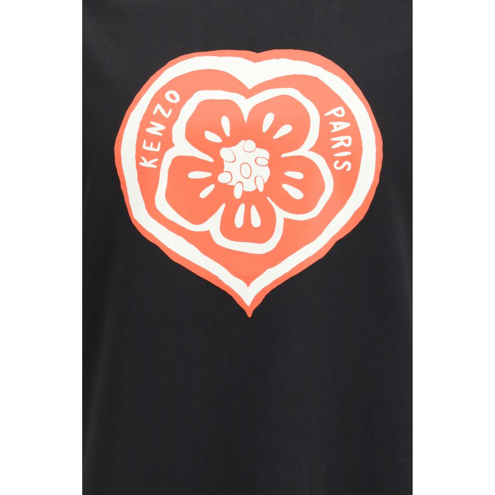 A black cotton t-shirt with a red heart design on the front