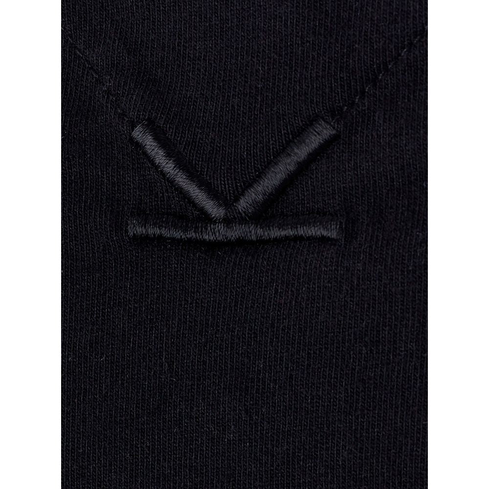 Black fabric with embroidered emblem