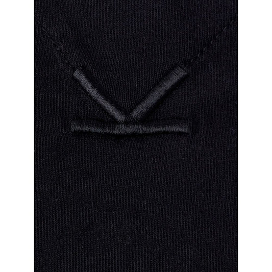 Black fabric with embroidered emblem