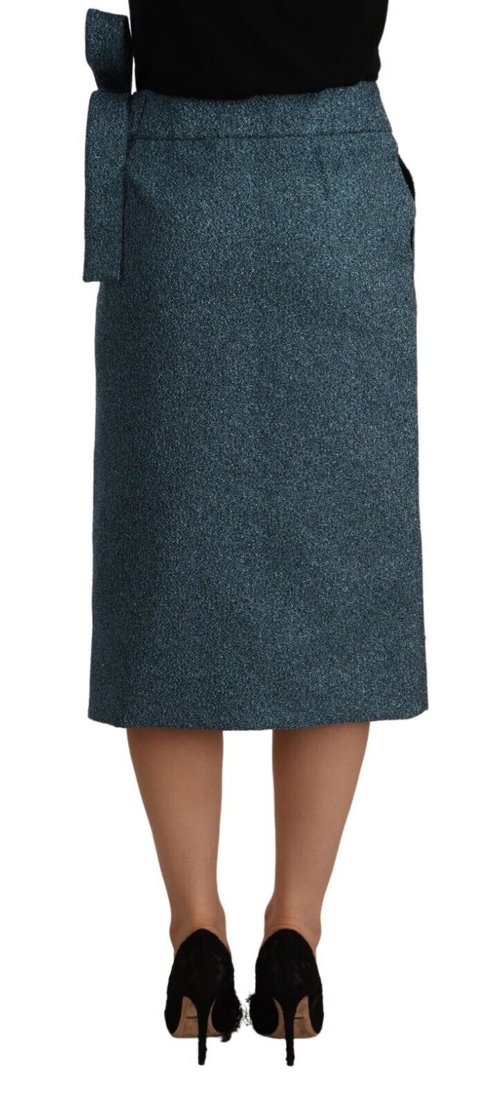 Woman wearing a blue skirt and black shoes