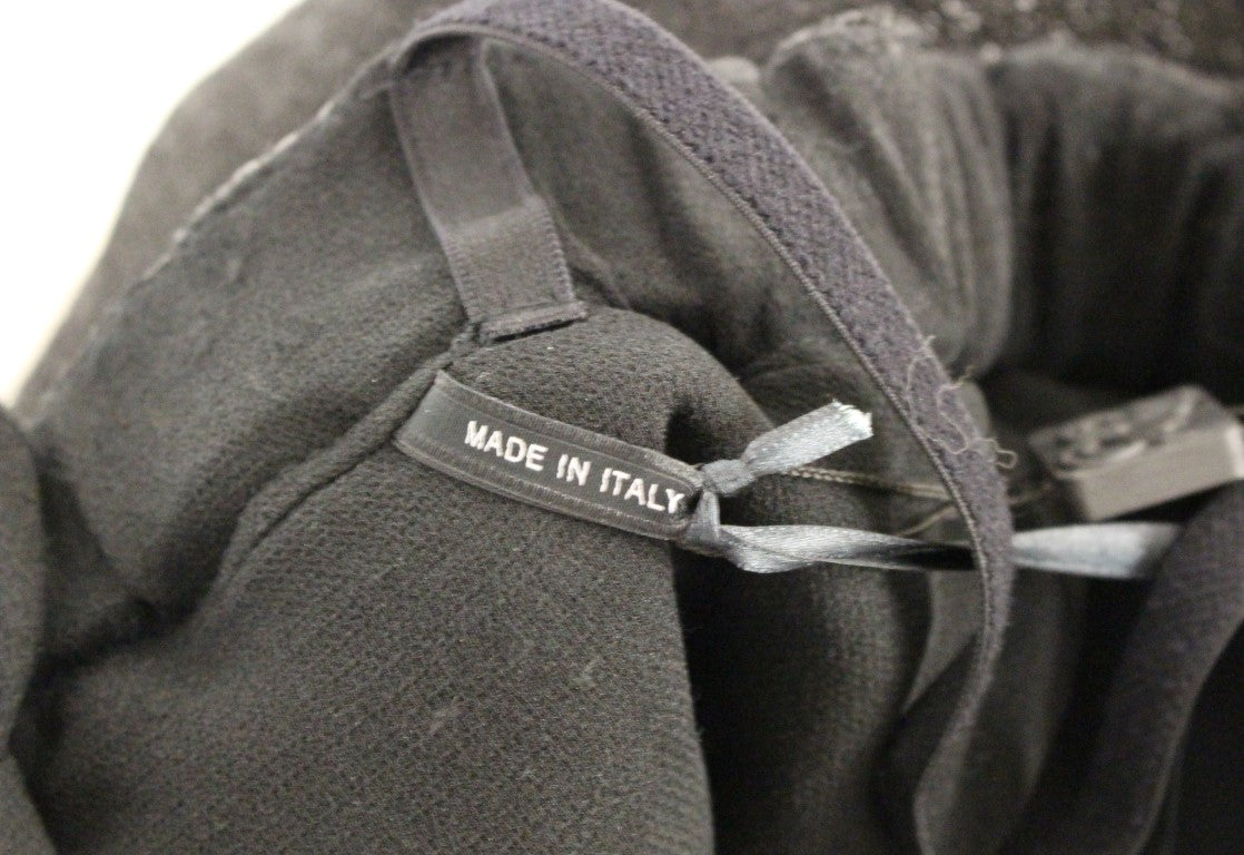 Black boot with label reading "made in italy"