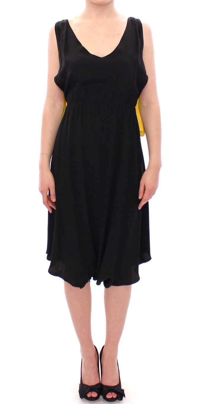 Black dress with ruffles at bottom