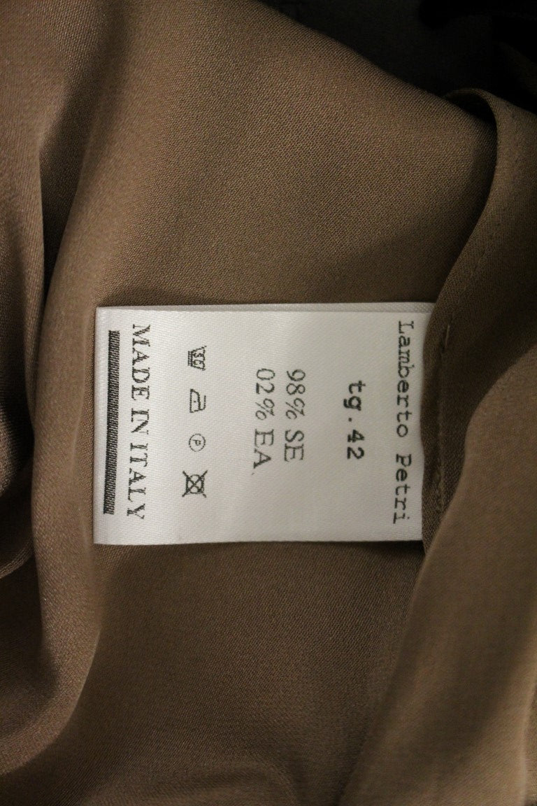 Brown fabric with white label showing country of origin and care instructions