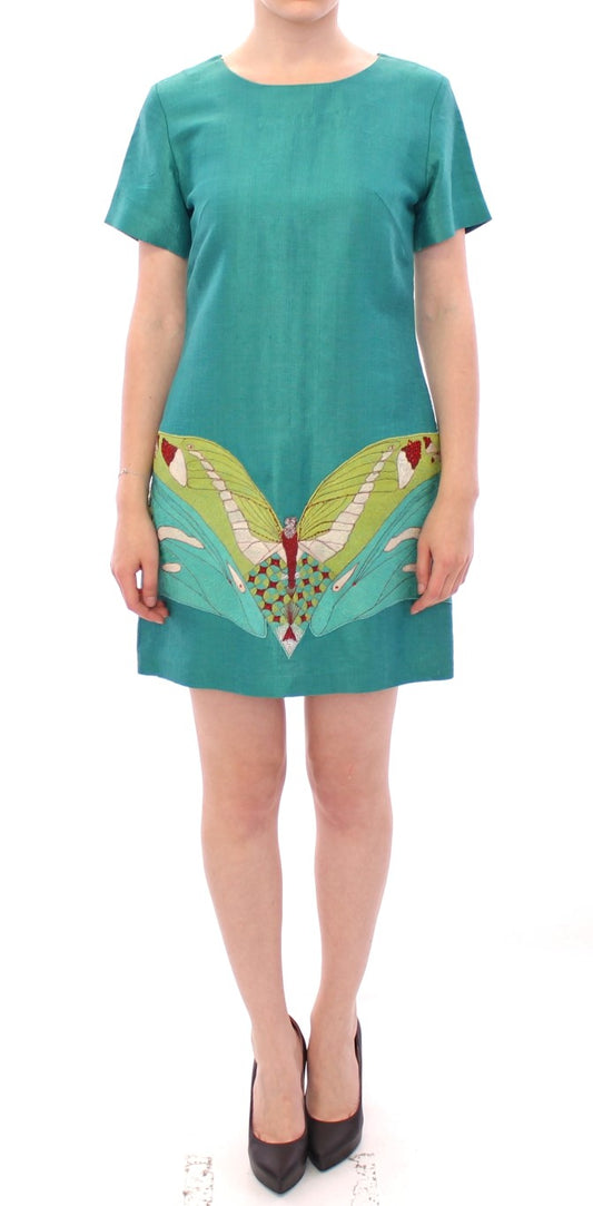 Green dress with butterfly print on front