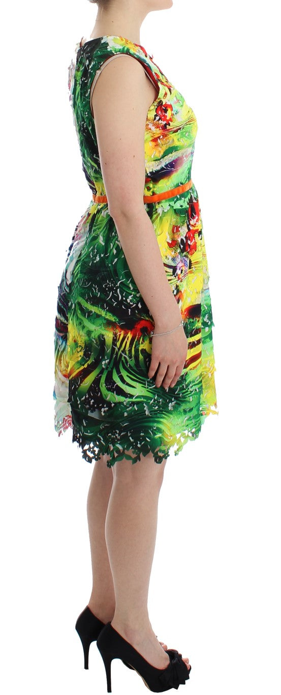 Woman wearing a colorful dress with black heels