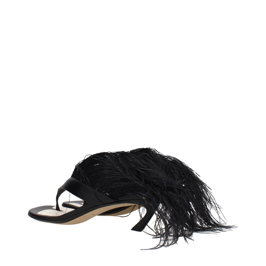 Black sandals with fringe detail