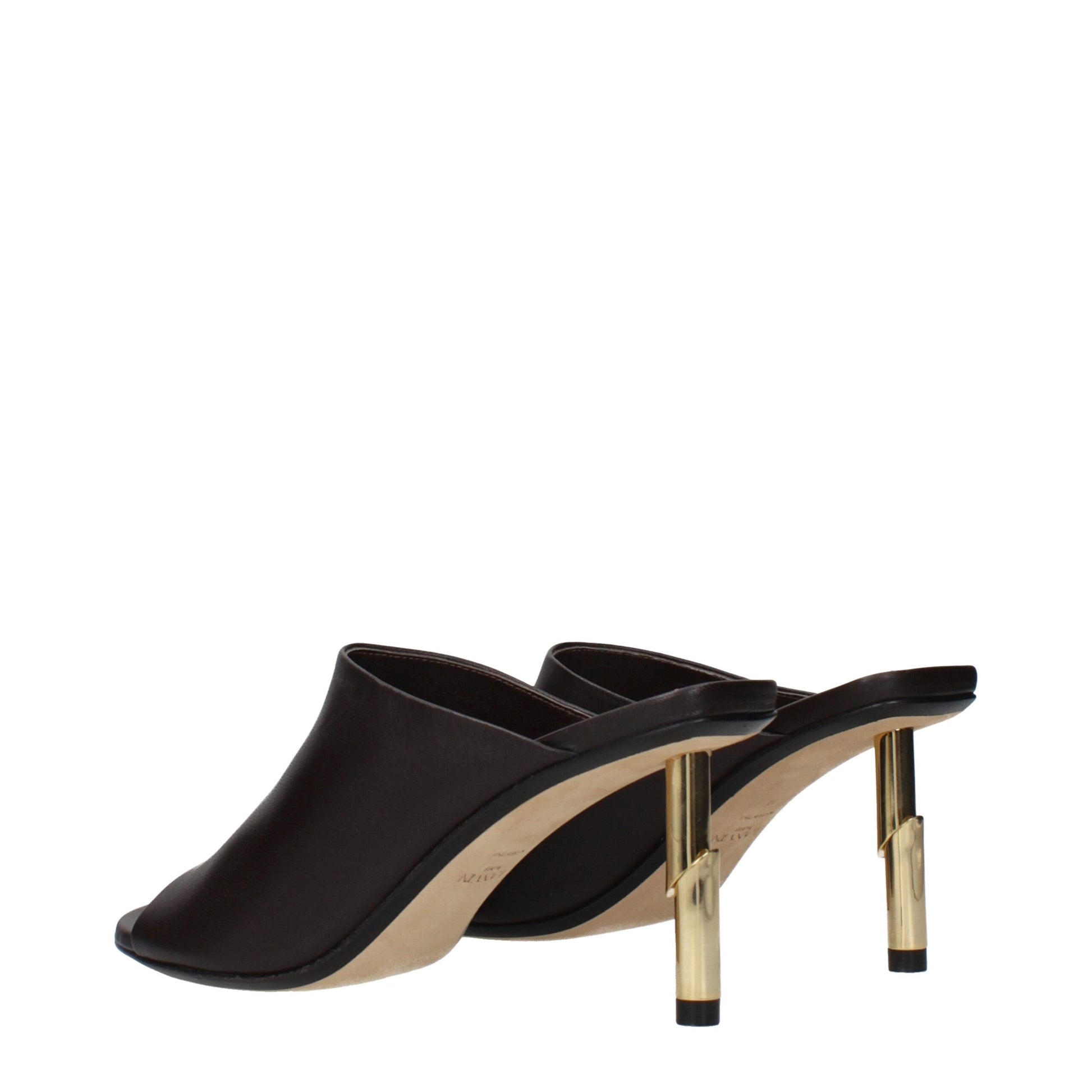 Black high heel shoes with gold accents