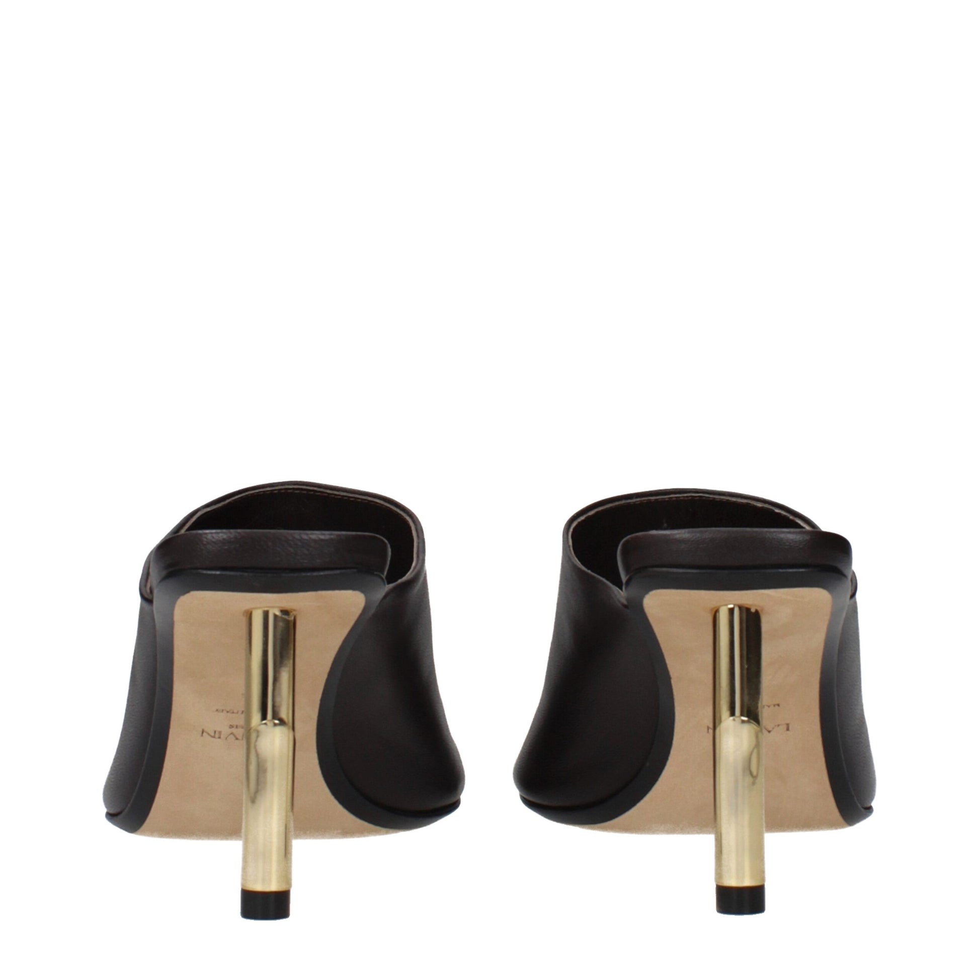 Pair of brown high heel shoes with gold accents