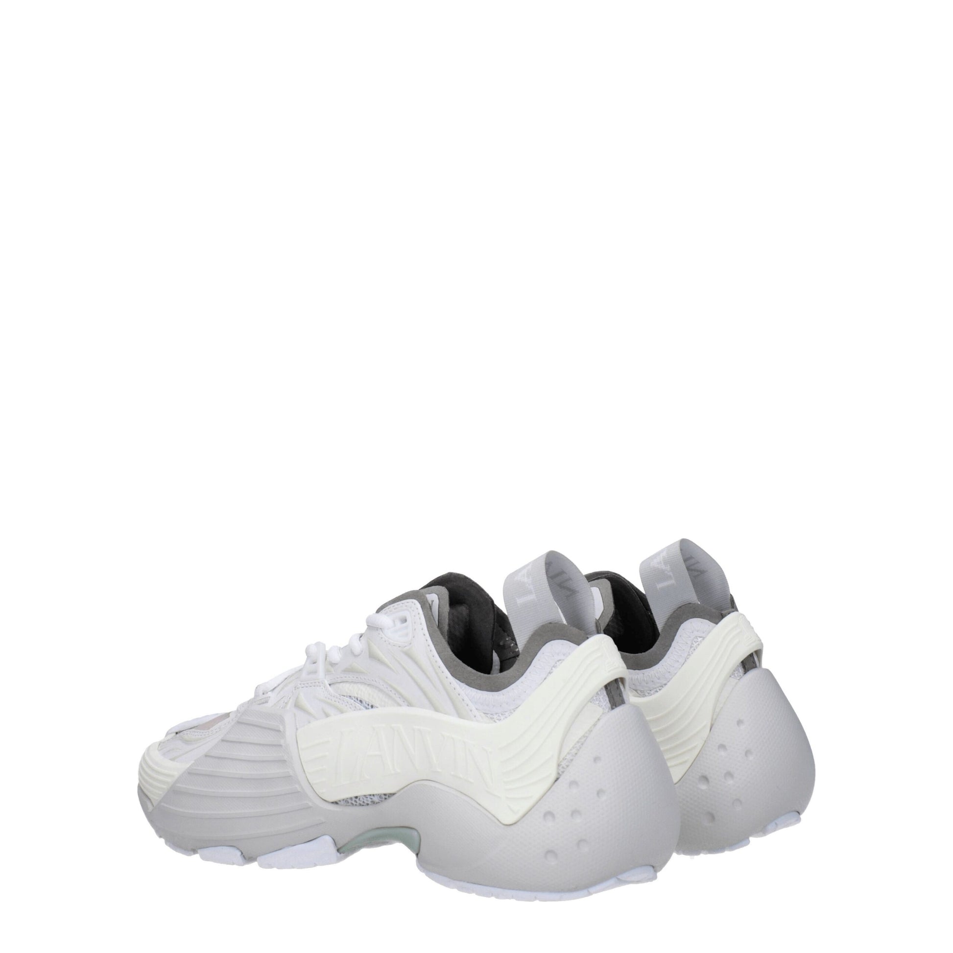Pair of white leather athletic sneakers with black laces, featuring a textured design and a low-top style