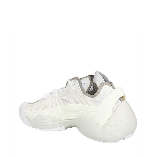 White sneaker with black laces and a white sole