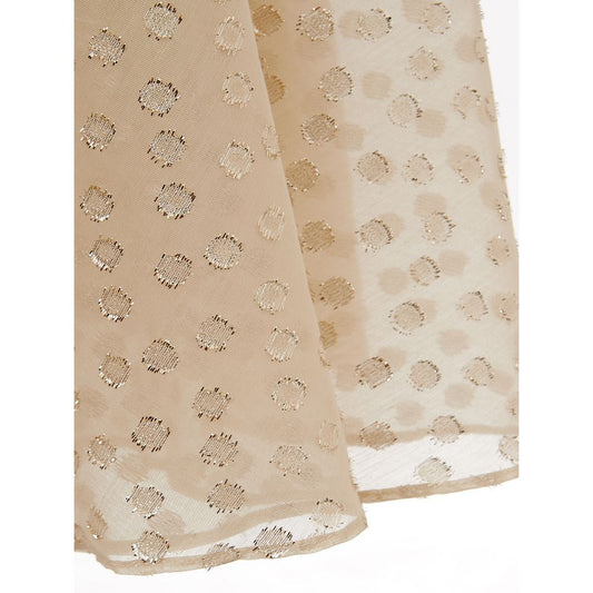 A beige cotton cocktail dress with sequin polka dots