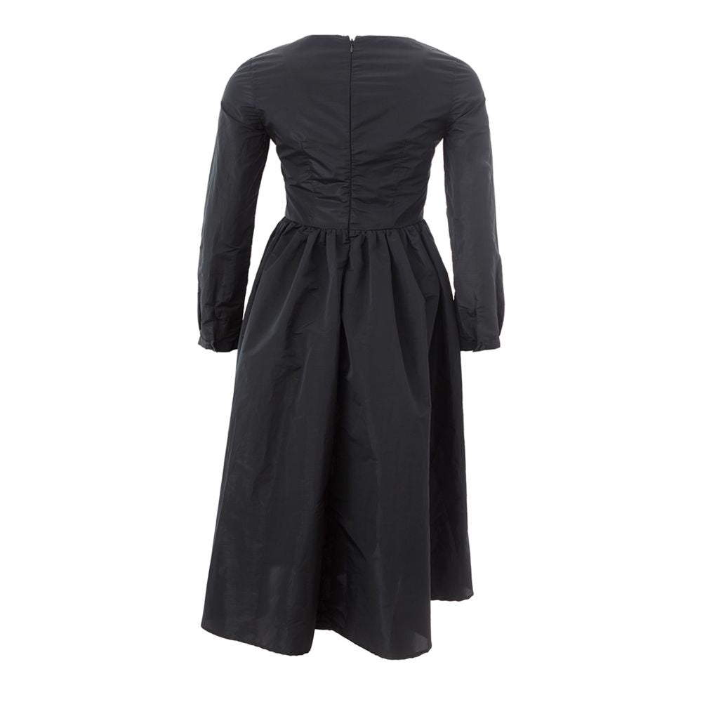A black cocktail dress with a high neckline, long sleeves, and a flared skirt