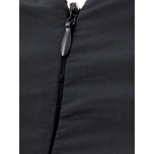 A black polyester cocktail dress with a zipper on the front