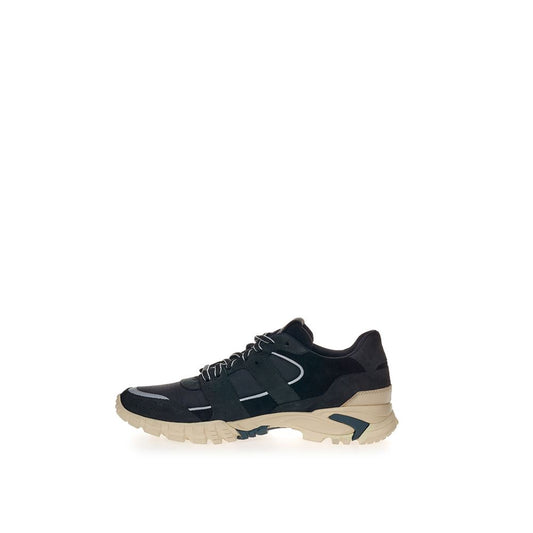 Black and tan athletic shoe with white laces and logo on side