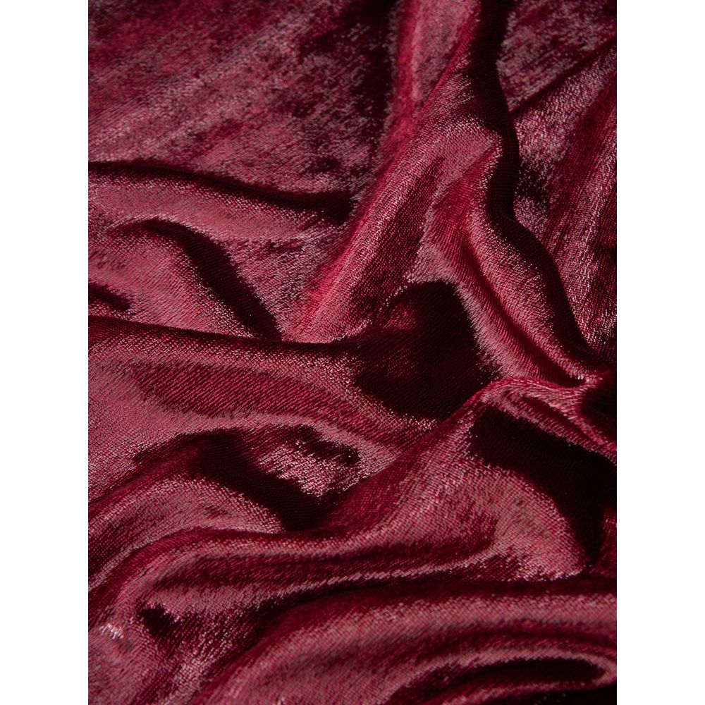 A red velvet fabric with a smooth texture, suitable for a cocktail dress