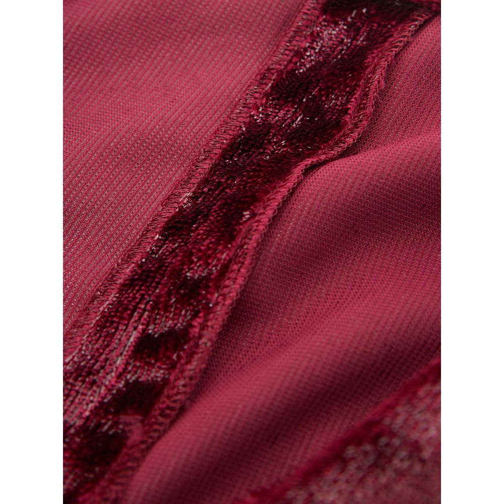 A red cocktail dress with a textured fabric and a V-neckline