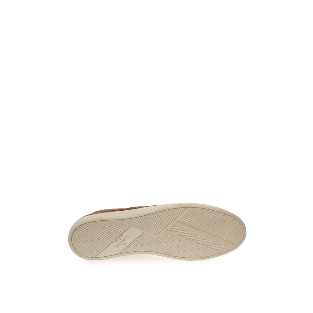 Tan canvas shoe with tan rubber sole and brown laces