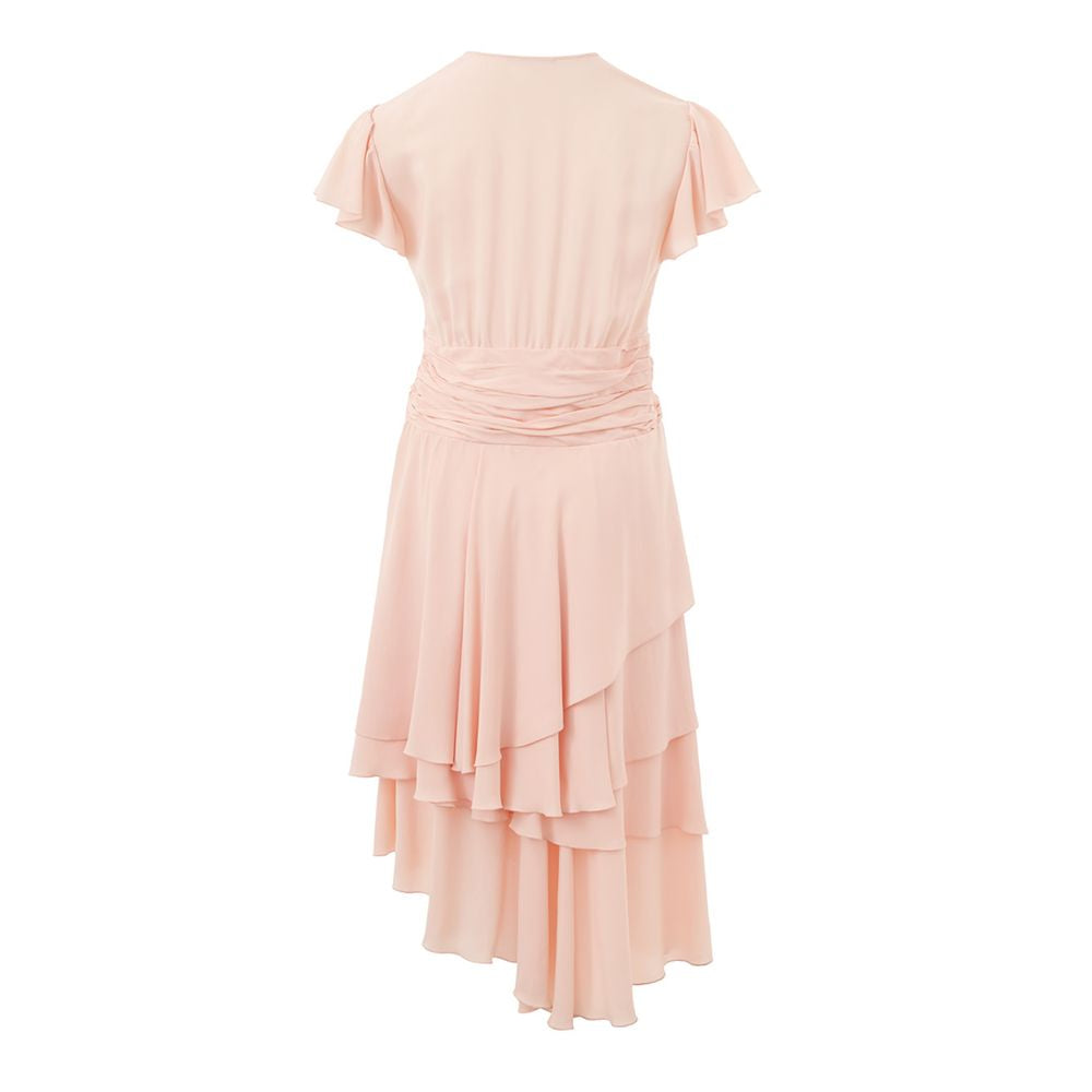 A pink casual dress with ruffles on the skirt