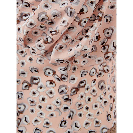 A pink dress with a leopard print pattern