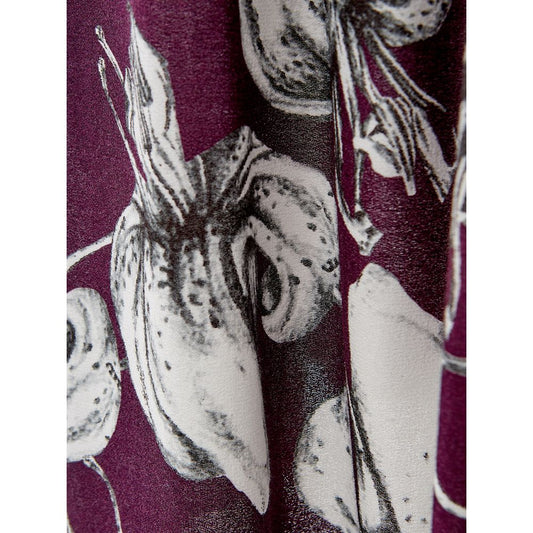 A purple viscose casual dress with a floral pattern featuring large flowers and leaves