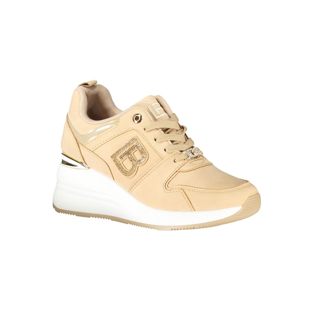 Tan women's sneaker with white sole, laces, and logo