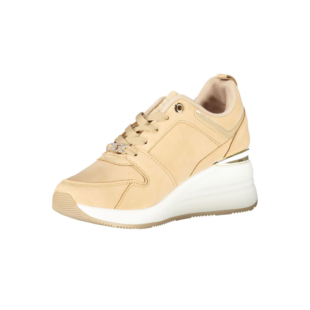 A beige women's sneaker with a white sole, featuring a lace-up front and a small bow on the side