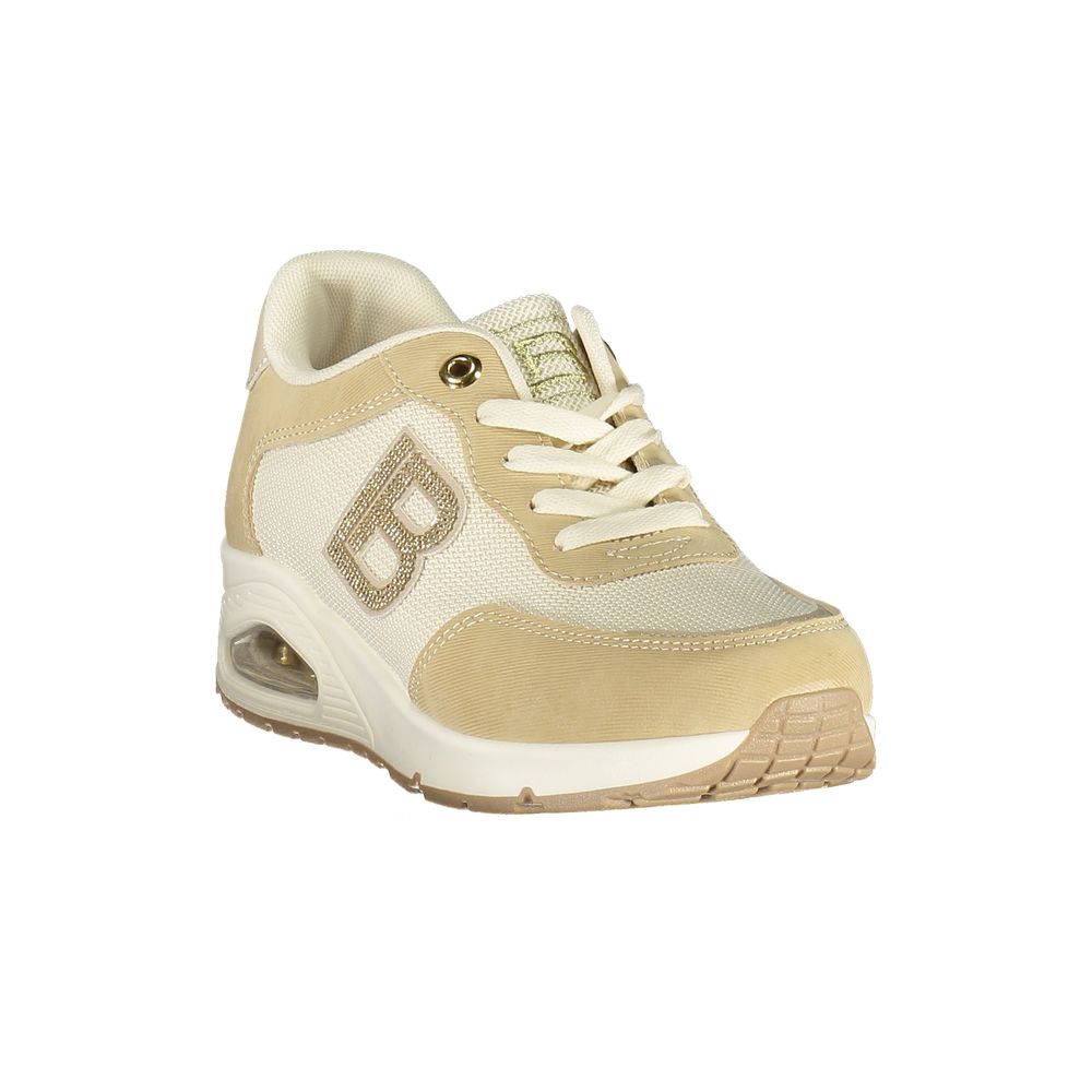 Tan women's sneakers with gold accents, lace-up closure, and rubber sole