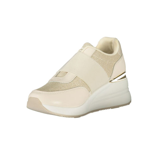 A beige women's sneaker with a textured sole, featuring a lace-up front and a pull tab at the back