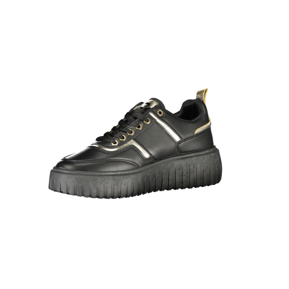 A black women's sneaker with gold accents, featuring a chunky sole and laces