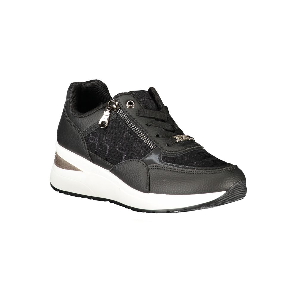 A black women's sneaker with white sole, featuring a zipper on the side and a logo on the tongue