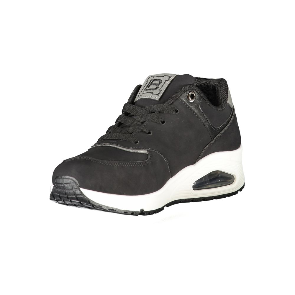 A black women's sneaker with white laces and a white sole