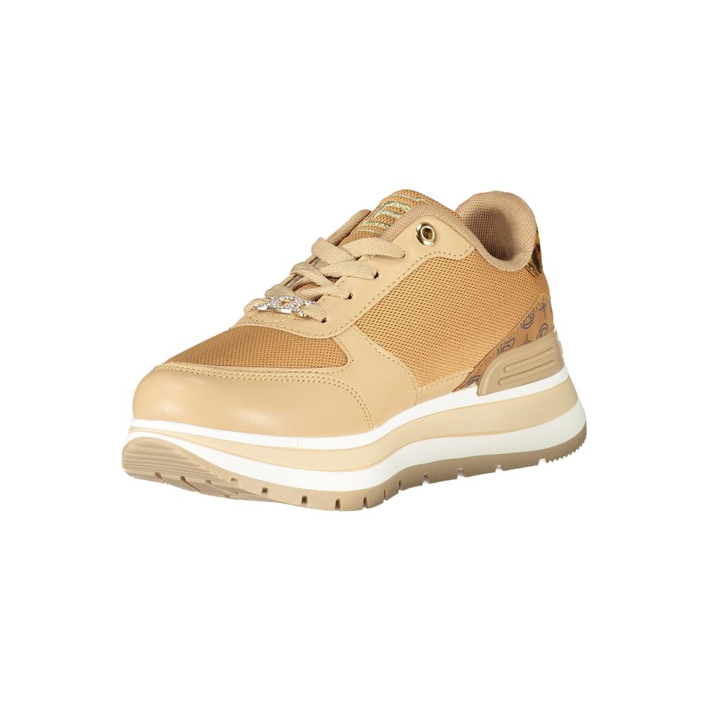 Tan women's sneakers with white sole, laces, and heel
