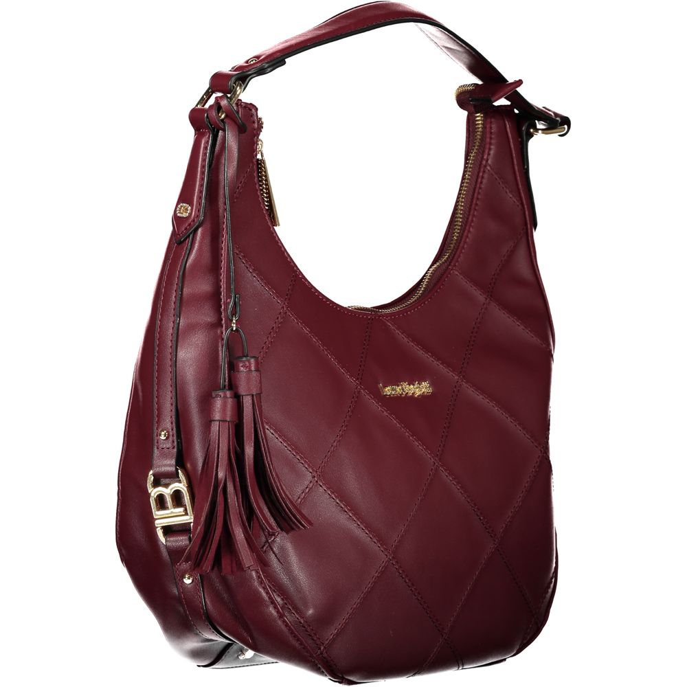 Red quilted leather handbag with fringe detailing