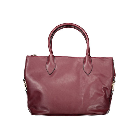Purple leather handbag with gold accents