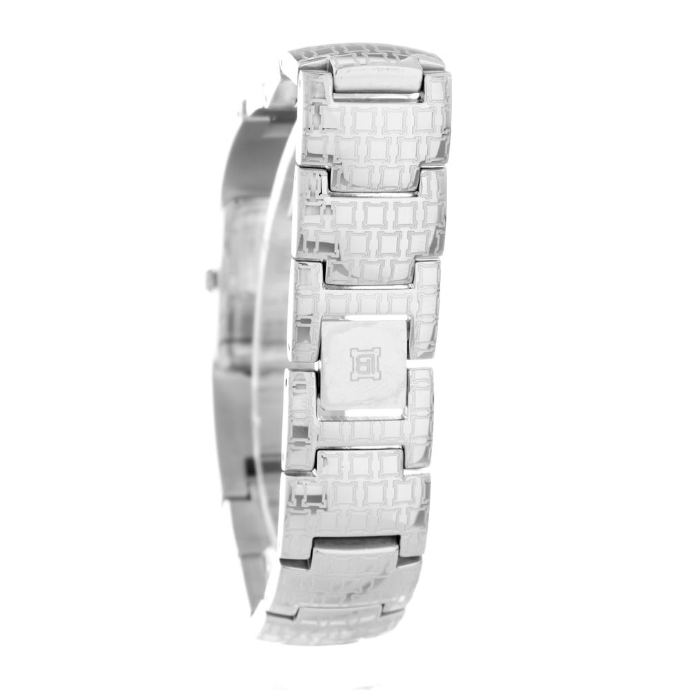 A silver stainless steel watch with a diamond-like pattern on the band and face, featuring a logo in the center of the face