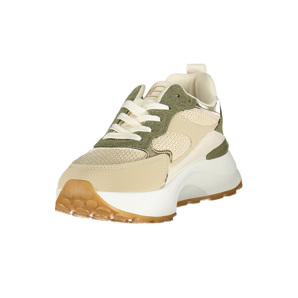 A tan and green women's sneaker with a lace-up front, featuring a chunky sole design