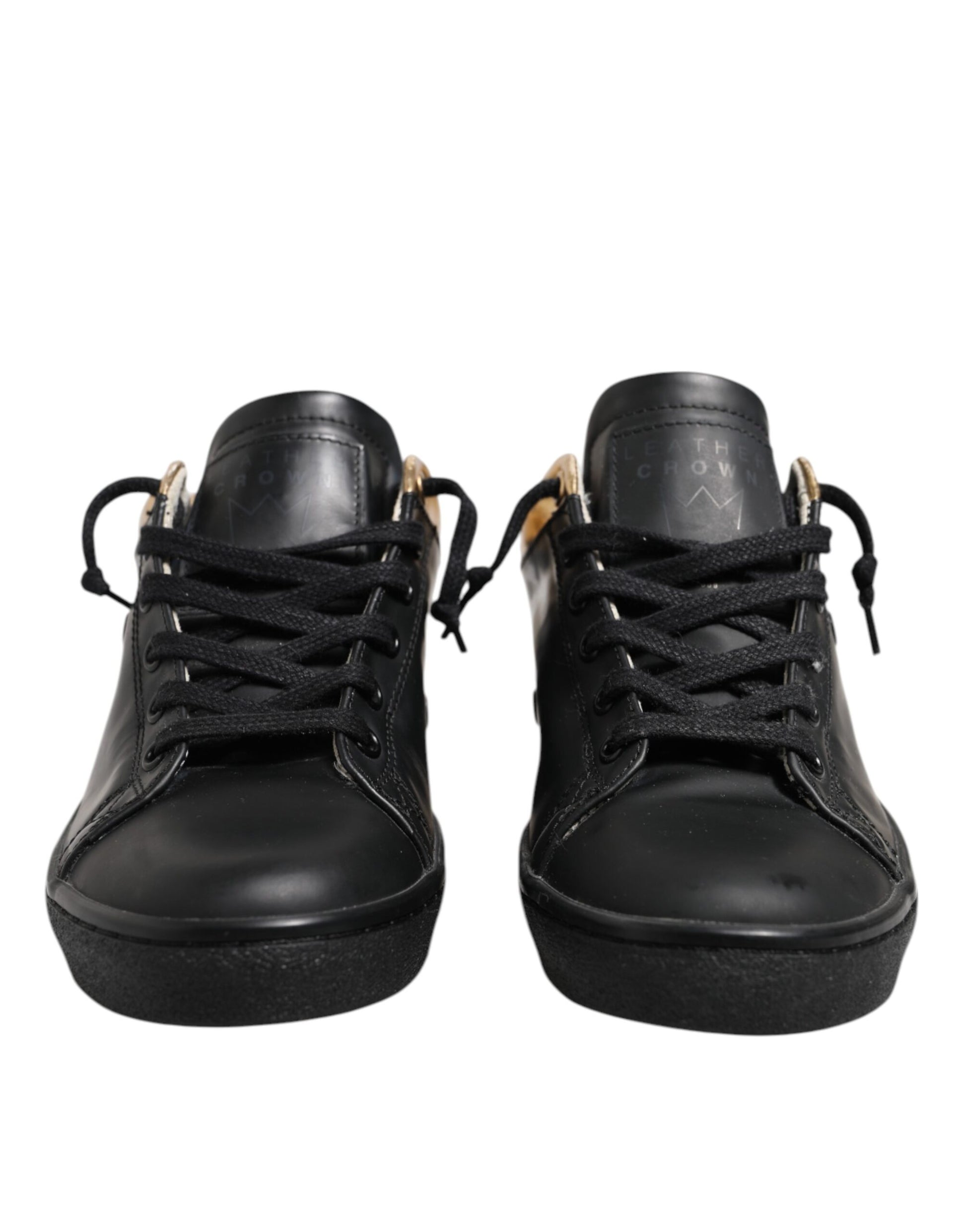 Pair of black sneakers with laces