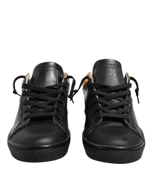 Pair of black sneakers with laces